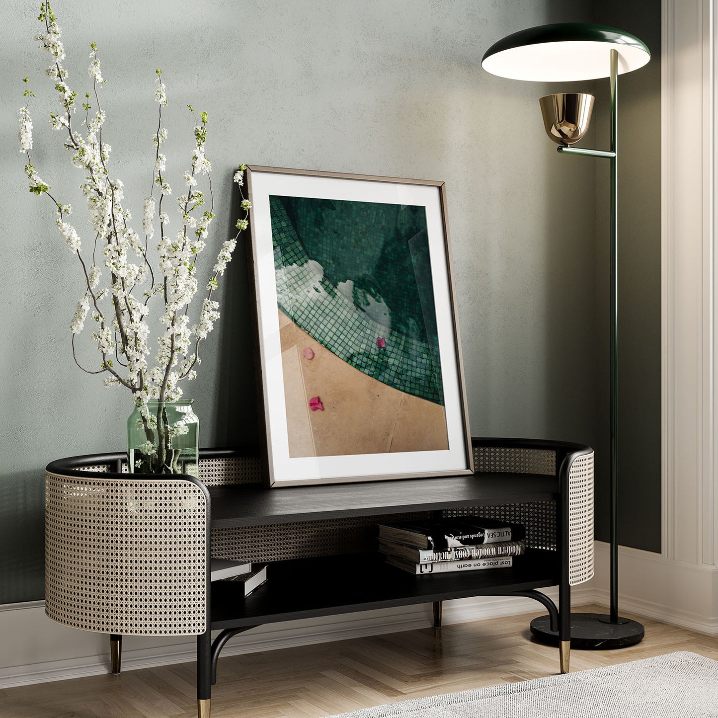 A modern entryway features the Moroccan Pool bench, a vase with flowers, framed art, and a tall floor lamp.