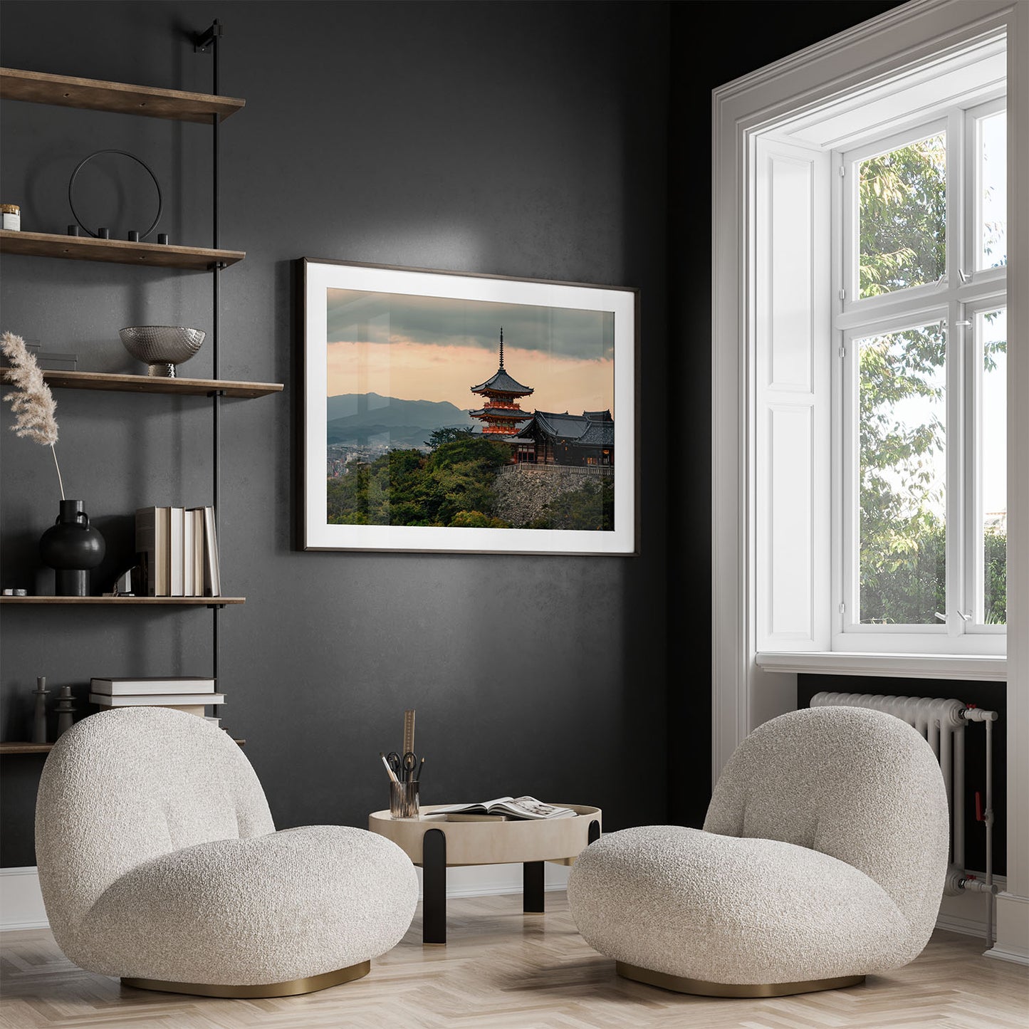 Cozy modern room with two white chairs, small table, shelves, and Kiyomizu-dera Sunset II framed art on dark wall.