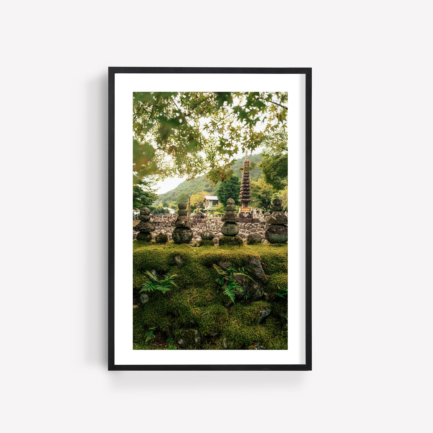 Framed photo titled Adashino Nenbutsu-ji features a serene garden with stone lanterns, lush greenery, and a pagoda.