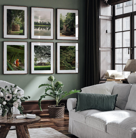 Bright living room with white furniture, green accents, plants, and Cambodian Lush - Set of 6 nature-themed photos.