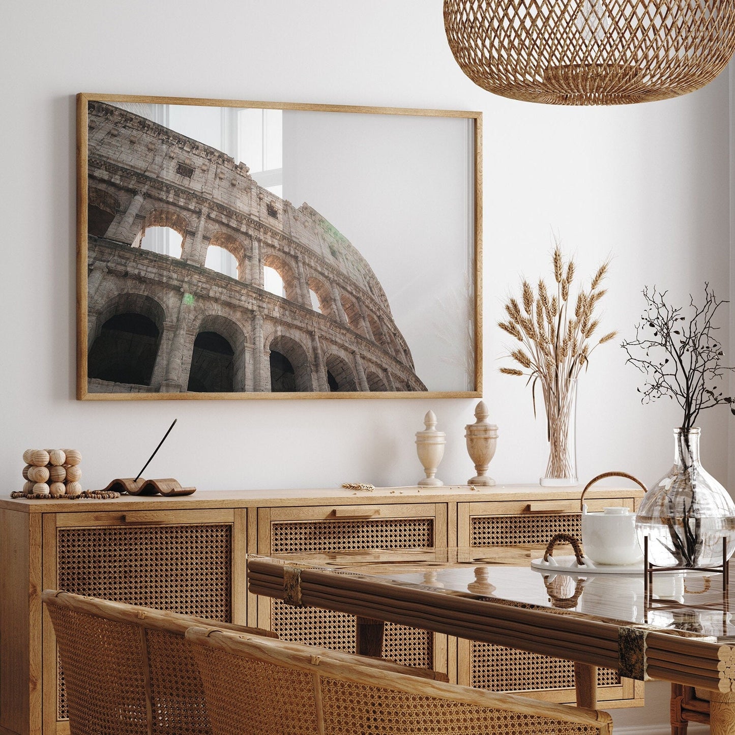 Colosseum I framed photo in a stylish dining room with rattan furniture and decorative vases.