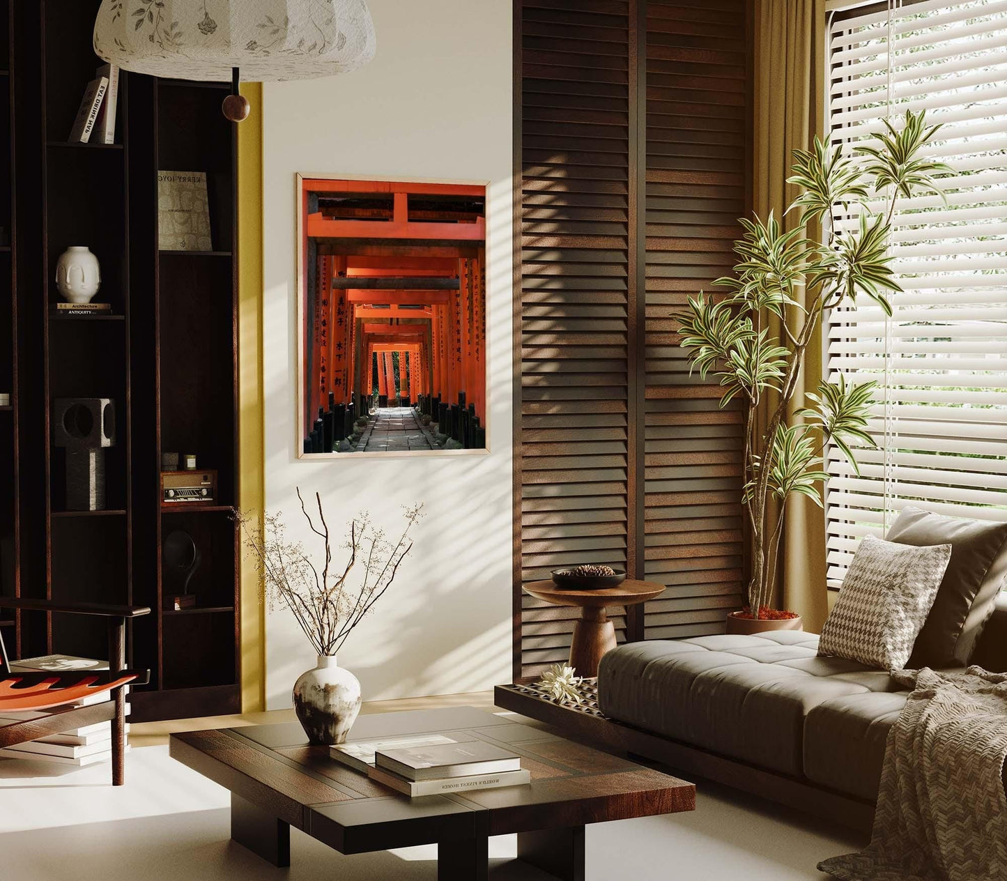 Modern living room with a beige sofa, wooden table, plant, and framed artwork titled Fushimi Inari Taisha III depicting red archways on the wall.