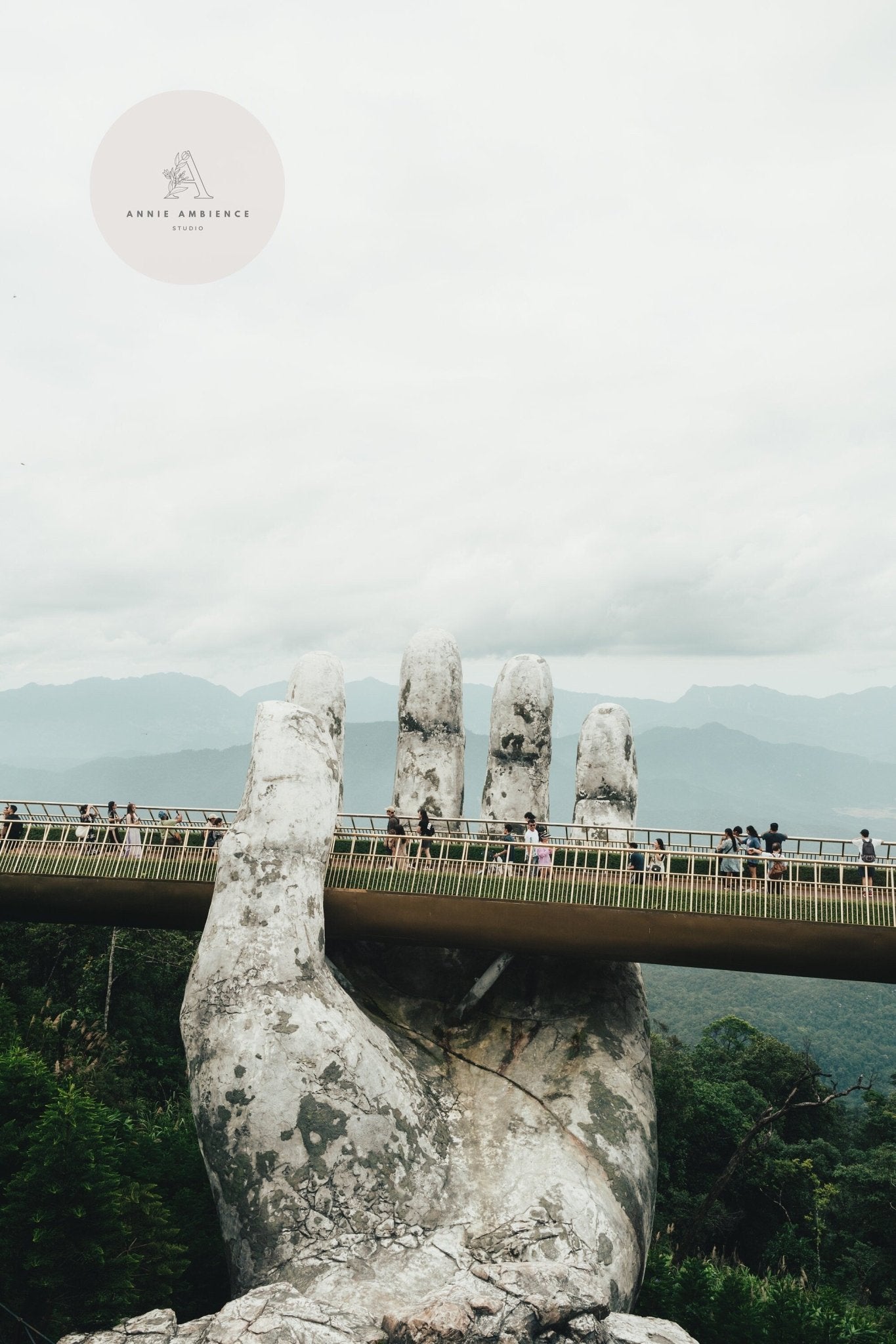 Golden Hand Bridge I features a massive stone hand holding the bridge, set against a scenic mountainous backdrop.