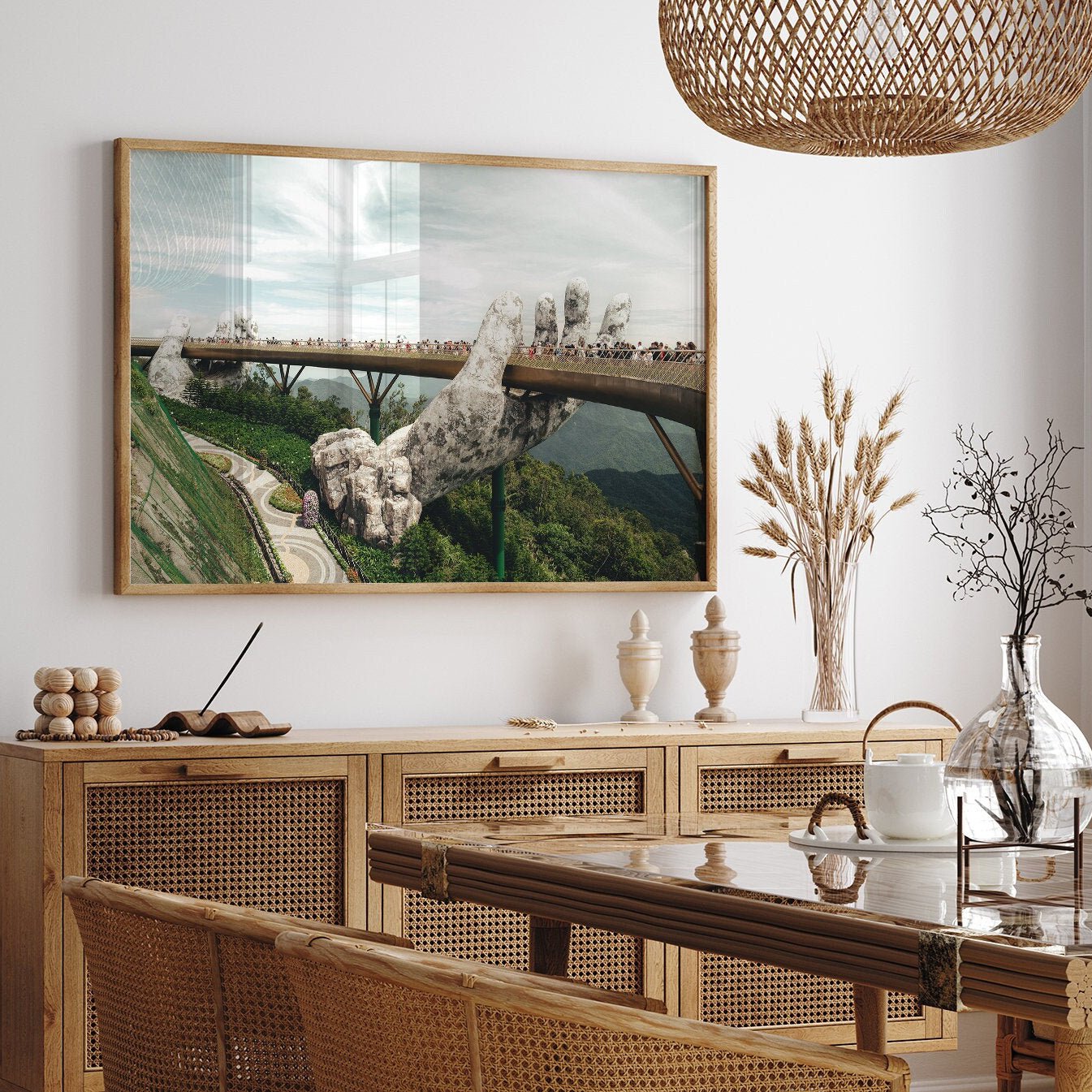 Dining room featuring Golden Hand Bridge II landscape painting, wicker furniture, and decor.