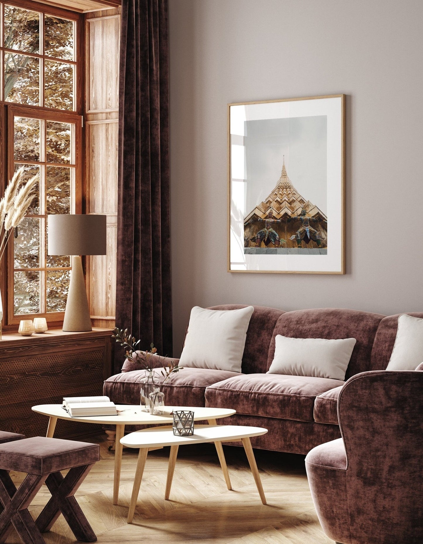 Cozy living room featuring the Grand Palace I velvet sofa, pillows, coffee table, framed art, and brown curtains for natural light.