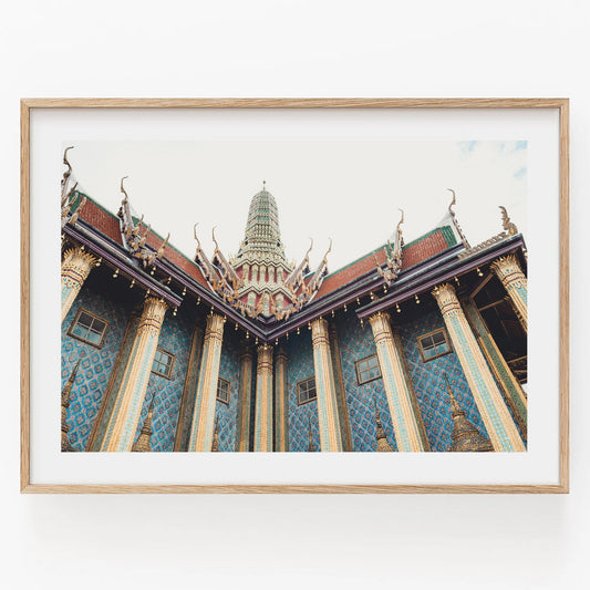 Framed photo Grand Palace IV showing blue patterned walls & gold columns, captured from below against a white sky.