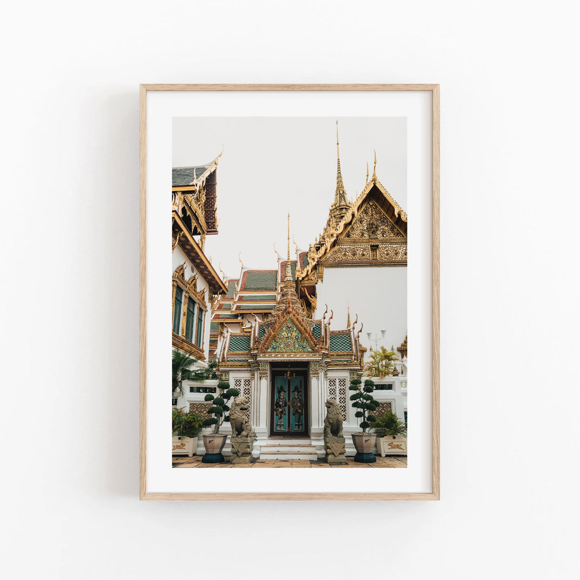 Framed Grand Palace V photo shows a detailed temple with ornate spires and colorful decorations on a white background.