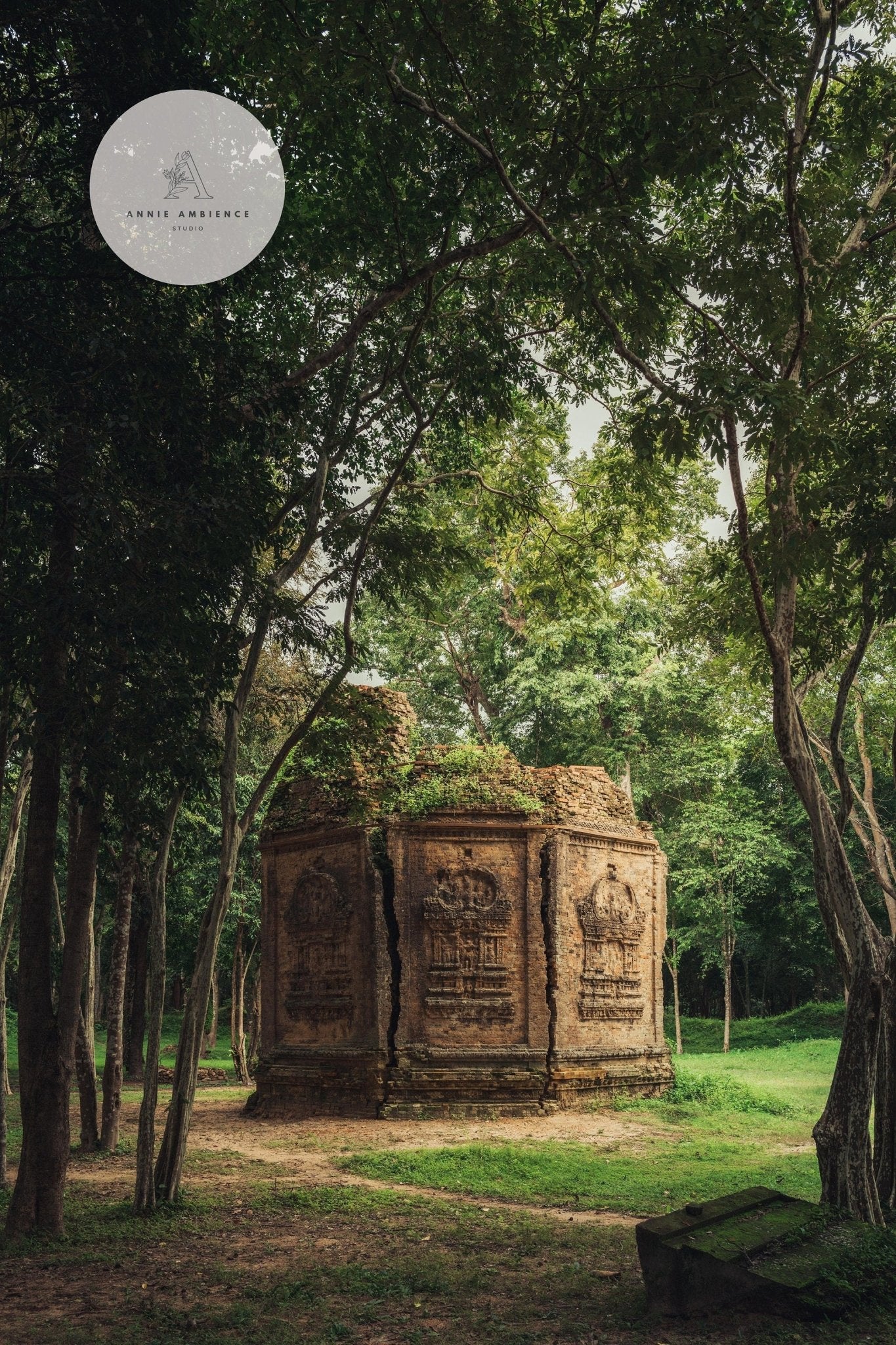 Green Peace, an ancient stone structure, is nestled among lush green trees in a serene forest.