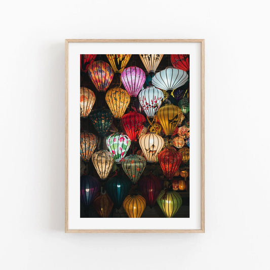Framed photo of vibrant Hoi An Lanterns displayed on a white wall.