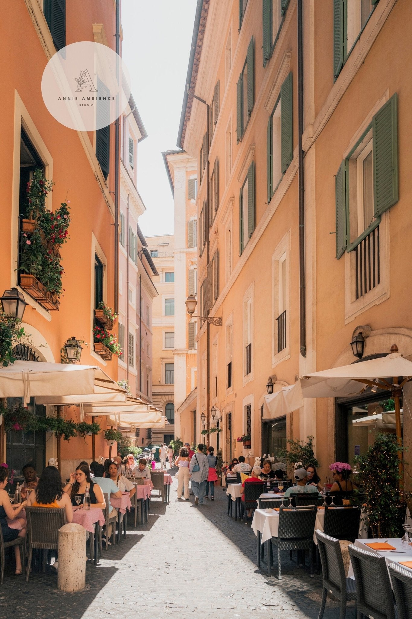 Lunch in Rome: Enjoy dining at an outdoor café on a narrow European street lined with orange buildings.
