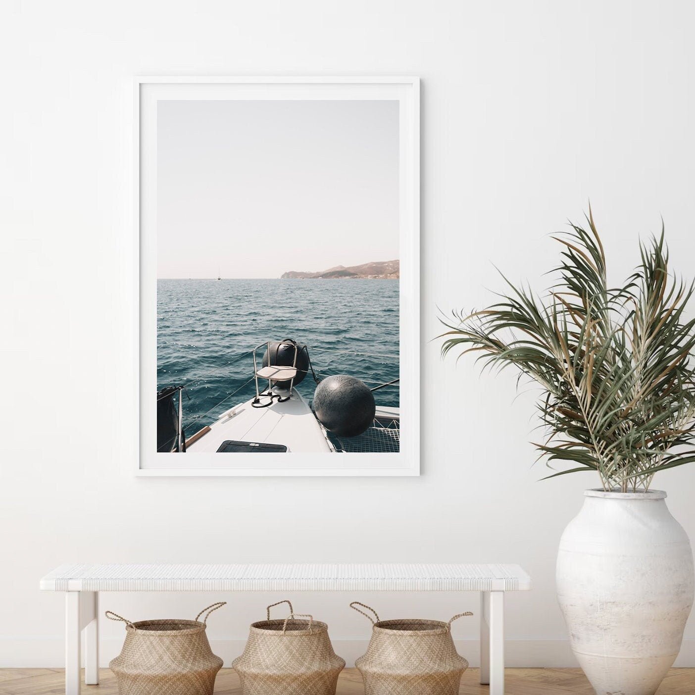Product: Mediterranean Bliss framed on a wall; bench, baskets below, and a large plant in white vase to the right.