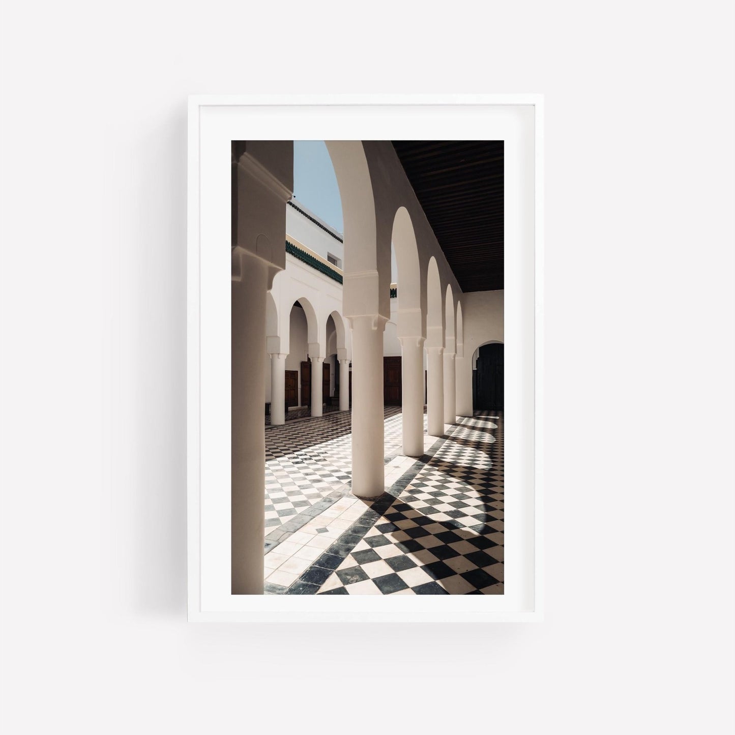 Moroccan Architecture II: Framed photo of an arched corridor, checkered tiles, and sunlight shadows.