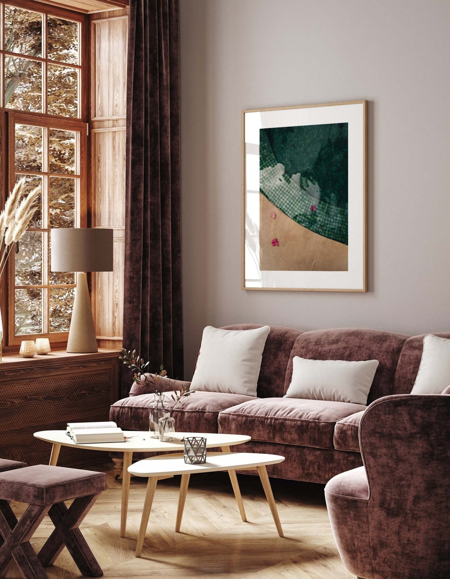Modern living room with Moroccan Pool velvet furniture, abstract art, and a large window with brown curtains.