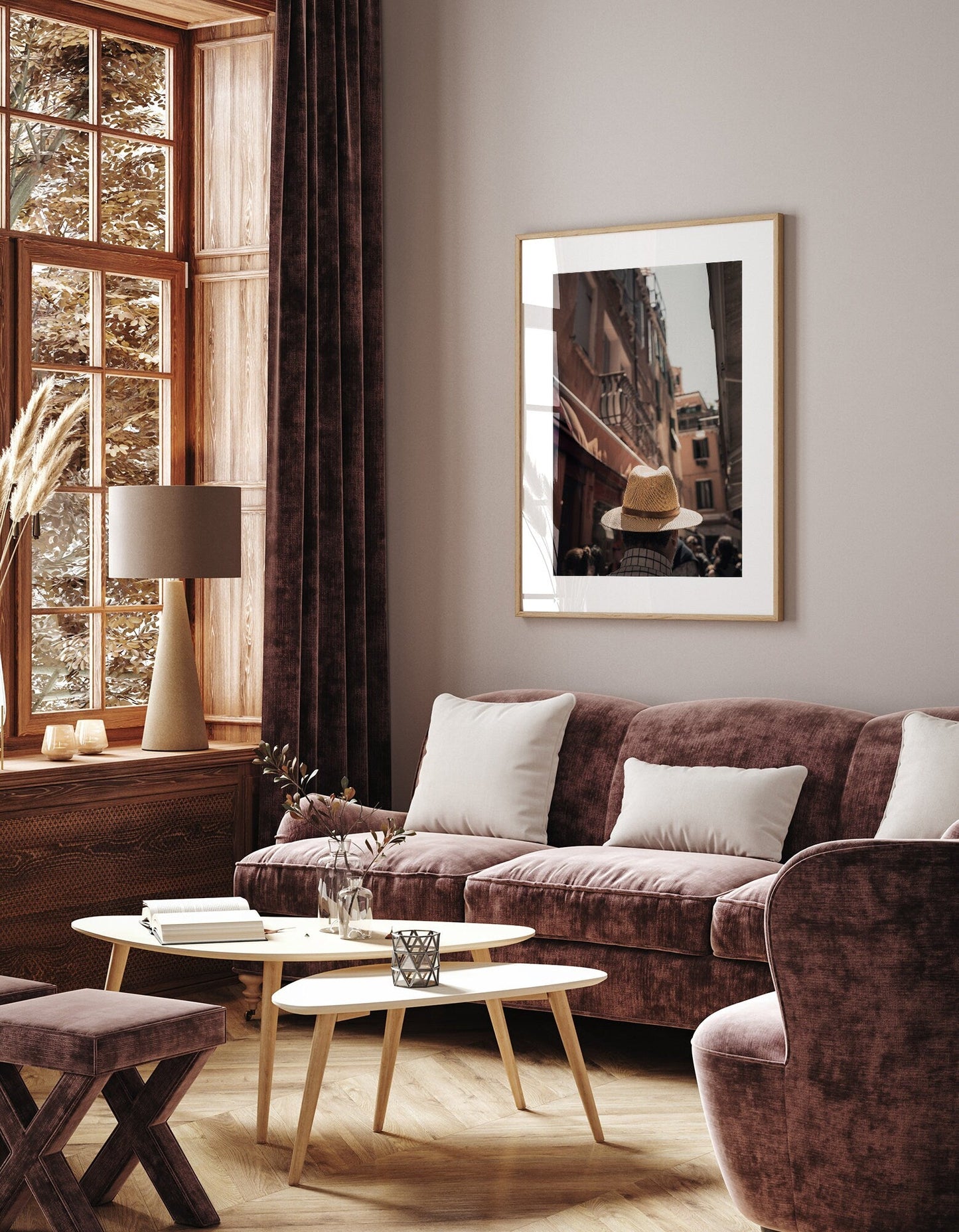 Cozy living room with a Mystery Man sofa, large window, and framed artwork on the wall.