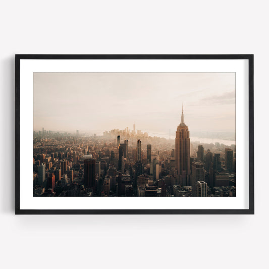 Framed photo of NYC Skyline Black and White featuring the Empire State Building at sunset, aerial view.
