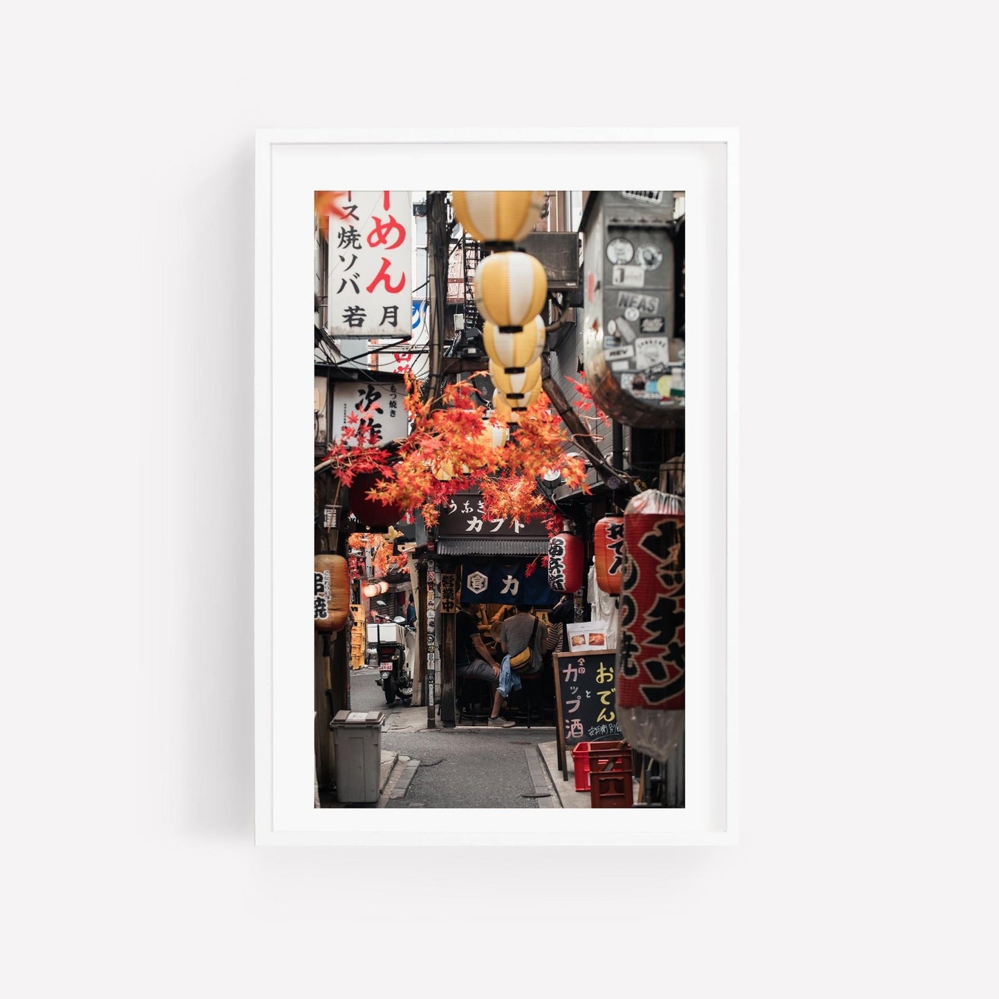 Omoide Yokocho wall art features a narrow Japanese street with red lanterns and autumn leaves.