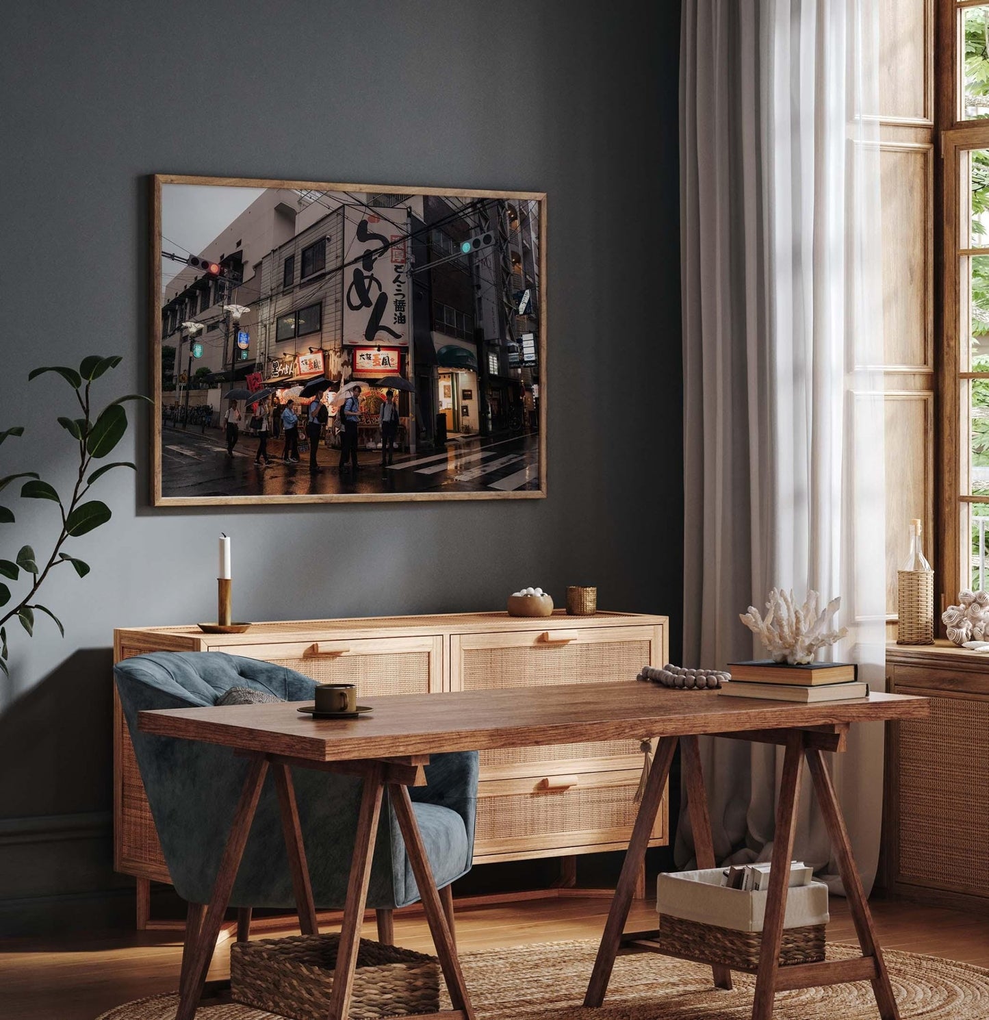 A cozy room featuring a wooden desk, plants, and a large Osaka Drizzle cityscape photo on the wall. Natural light streams through the window.