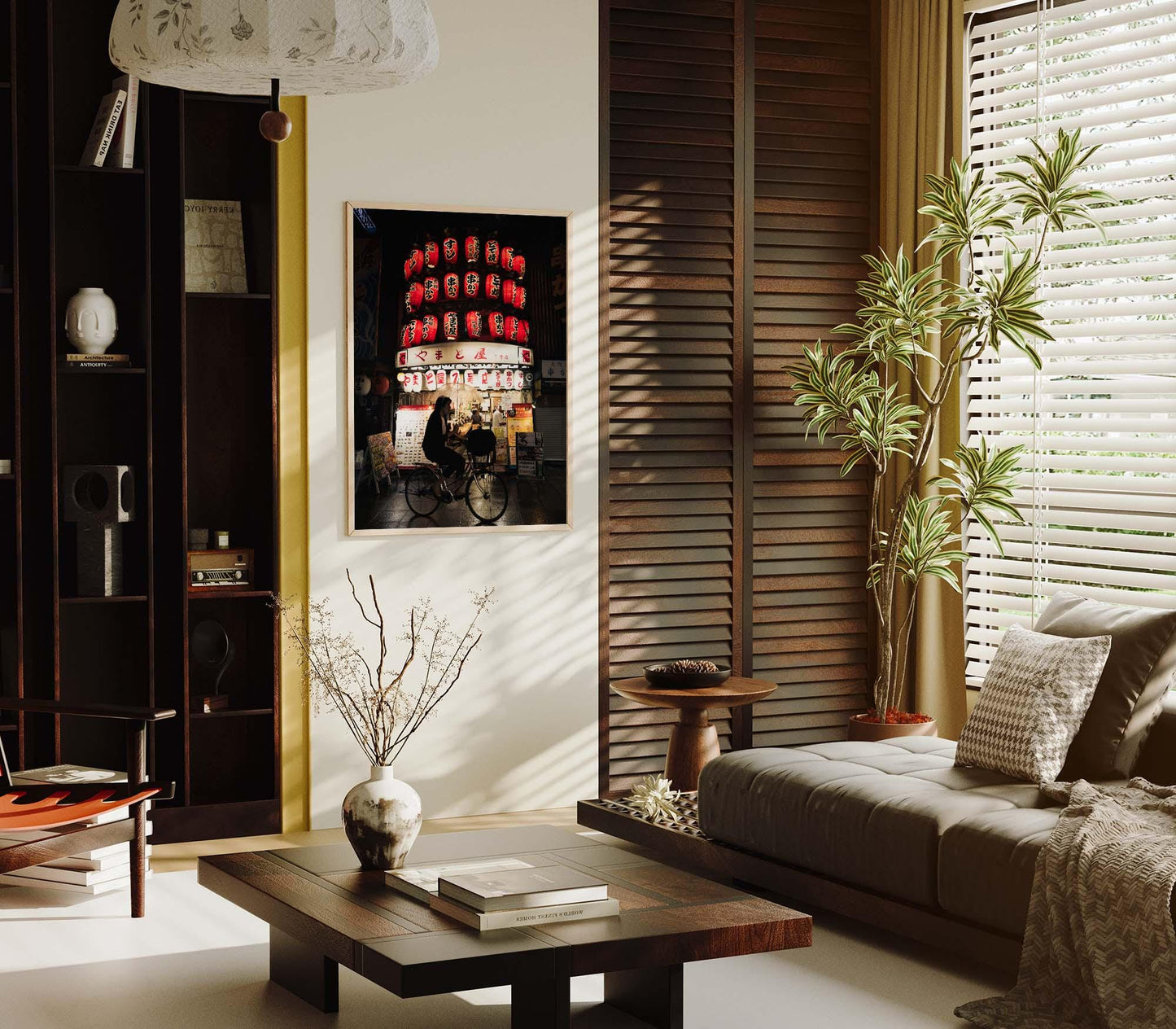 A modern living room with an Osaka Lantern Biker table, a cozy sofa, and wall art. Sunlight streams through the window blinds.