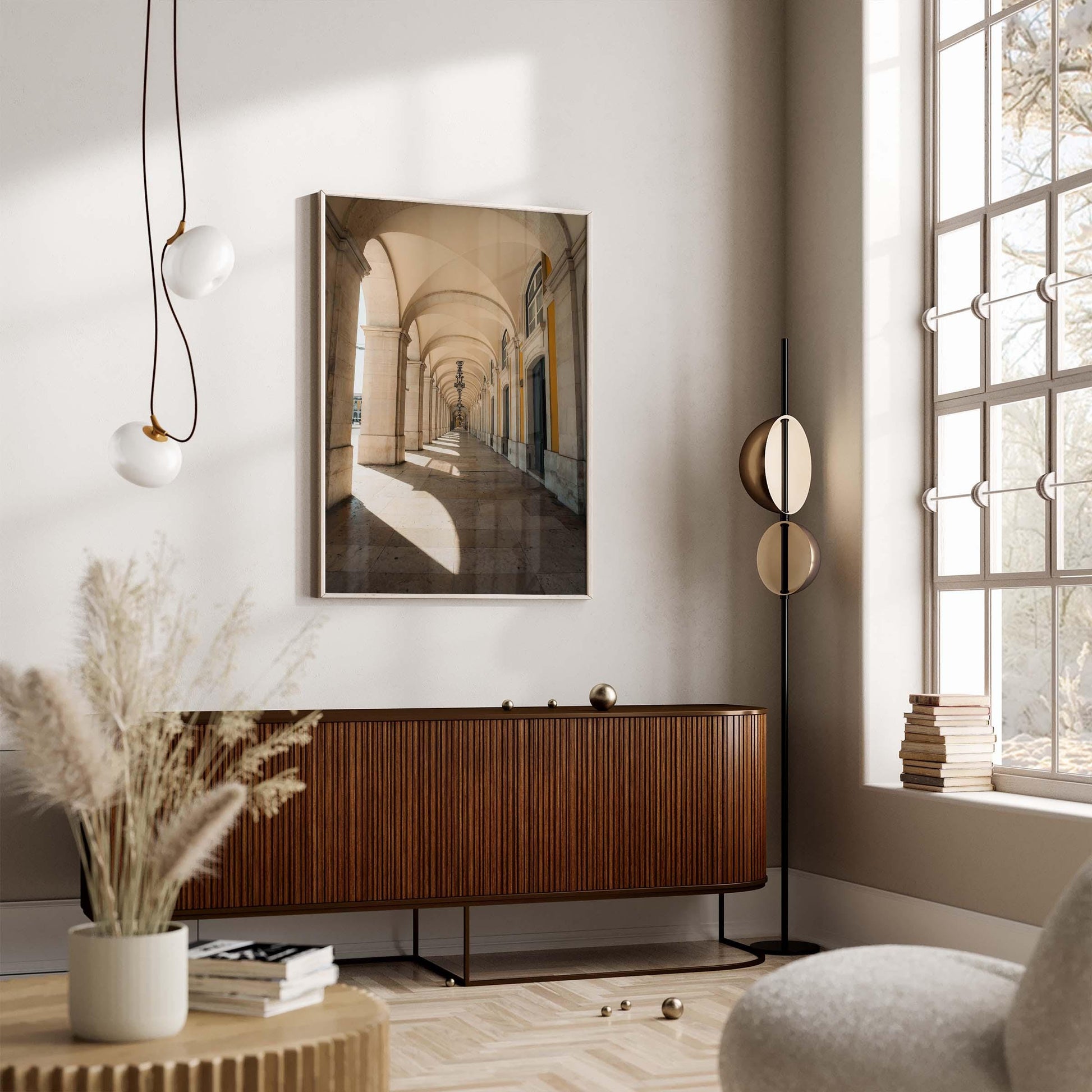 Minimalist living room with a large window, modern lights, wooden furniture, and the Rhythmic Arches artwork.