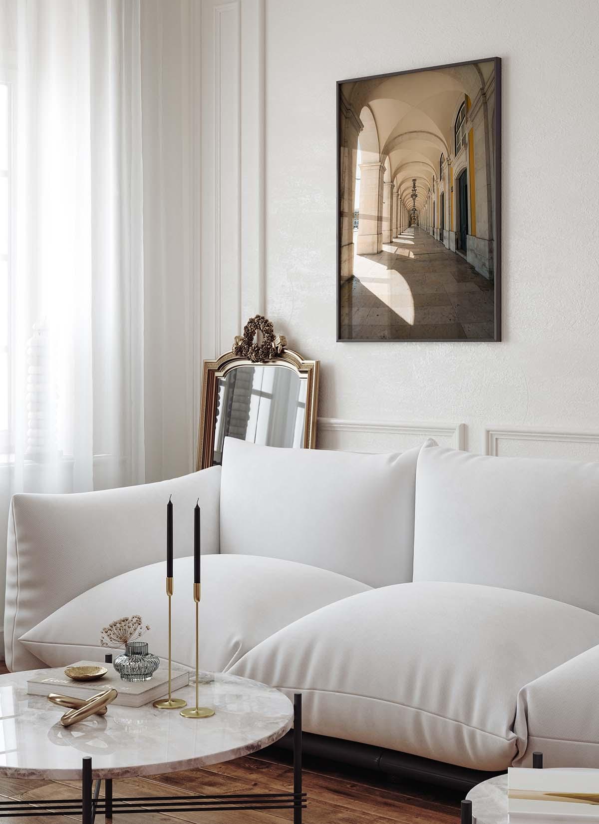 Bright living room with a white sofa, marble coffee table, wall mirror, and the Rhythmic Arches photo on the wall.