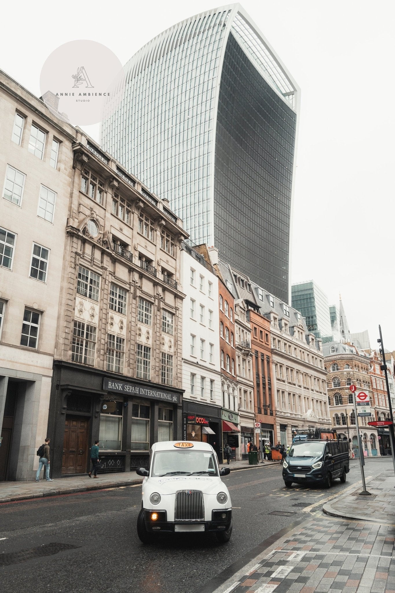 A vintage-style taxi drives in London with the Walkie Talkie building visible; Streets of London captures this scene.