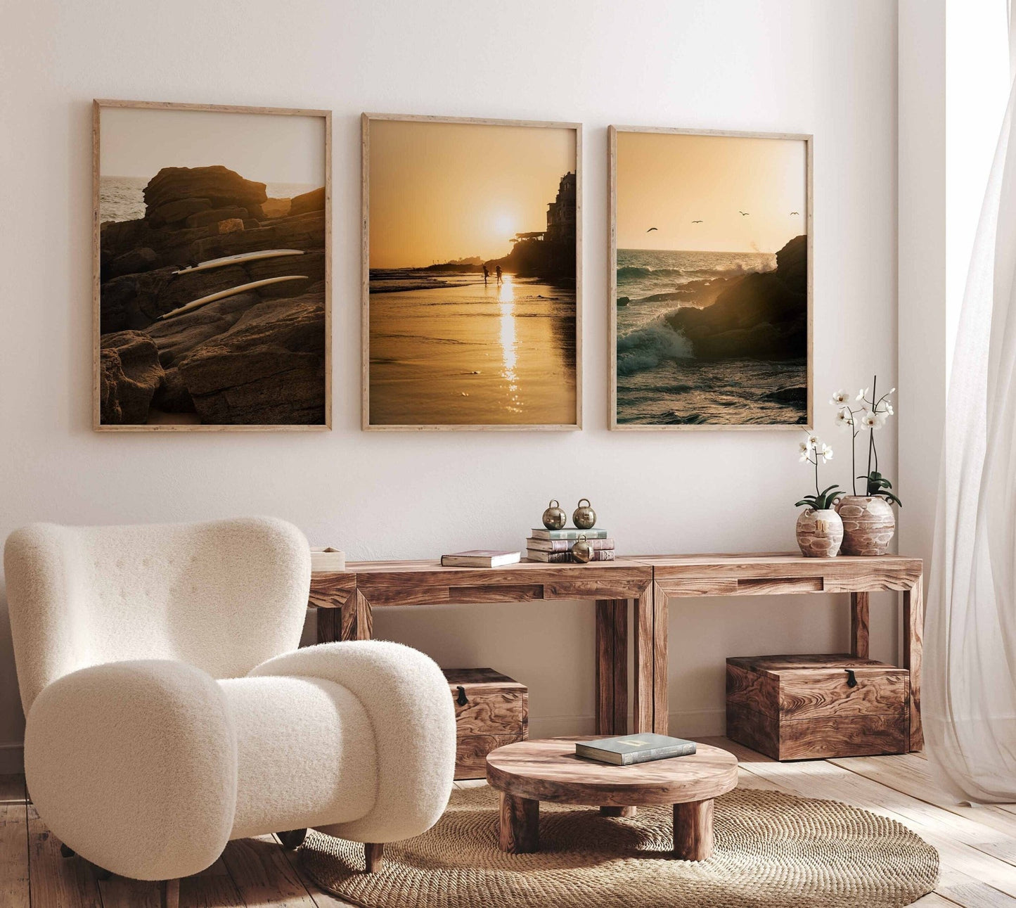 Cozy living room with a white armchair, wooden furniture, and the Taghazout Sunset - Set of 3 on the wall.