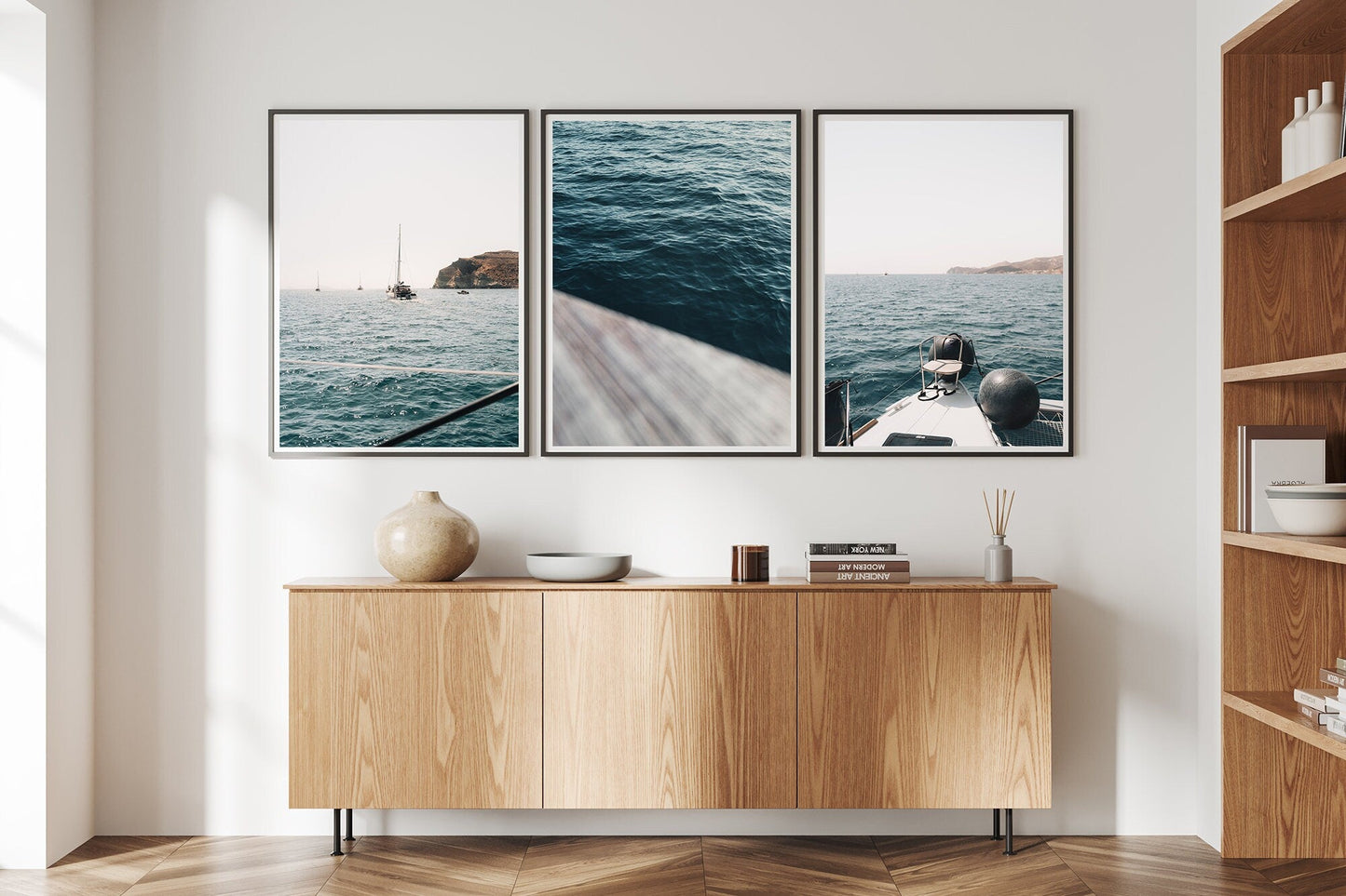The Teal Ocean - Set of 3 photos above a wooden sideboard with decorative vases in a modern living room.