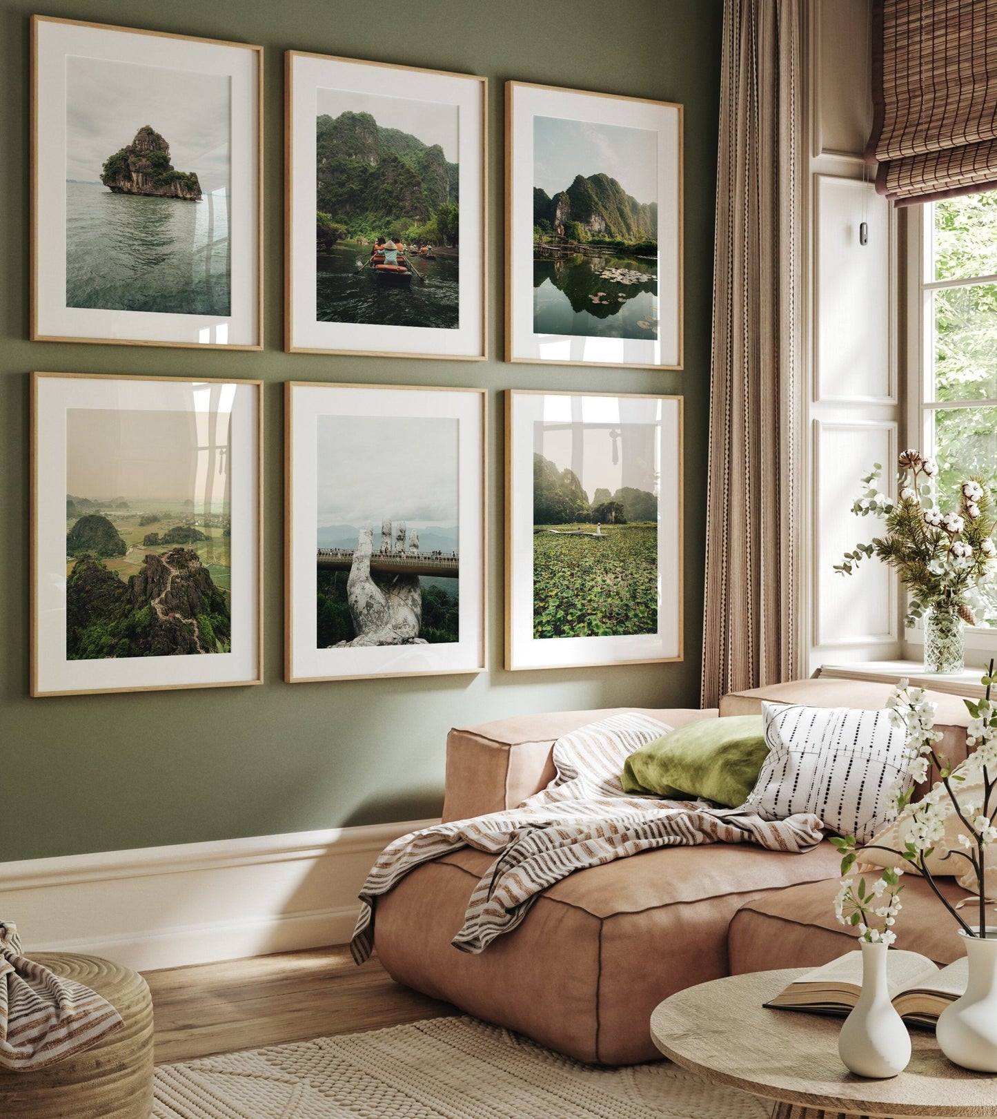 A cozy living room with a beige couch and green cushions, featuring Vietnam Nature set on a green wall. Bright window light.