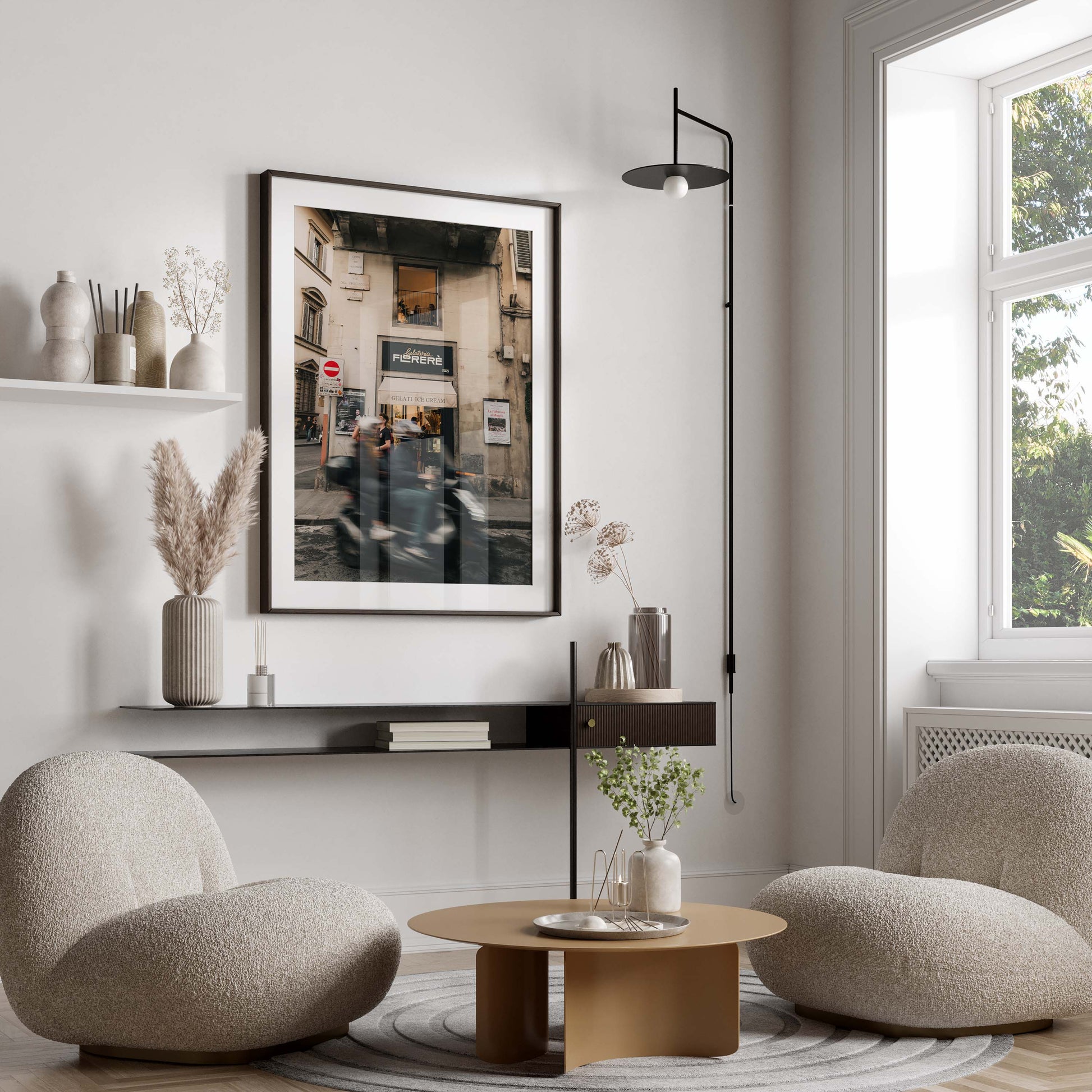 Modern living room featuring the Florence Motorcycle, two round chairs, low table, wall art, and neutral decor.