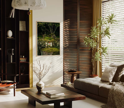 Modern living room with a wooden coffee table, plush sofa, plants, and the Three Wise Ones painting on the wall.