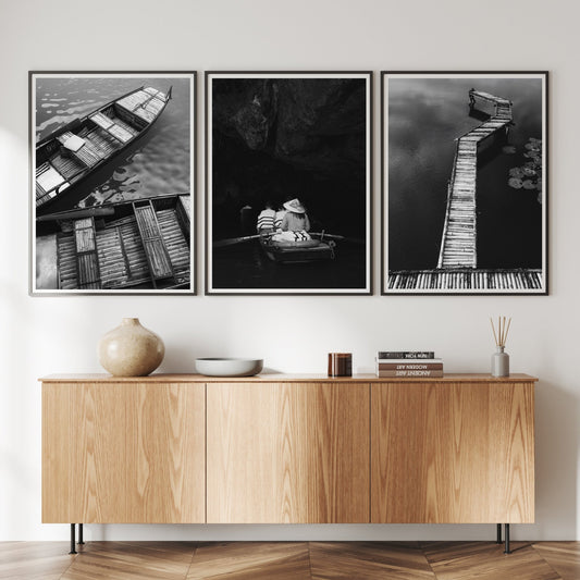 Minimalist room with wooden cabinet and Black and White Vietnam Bamboo - Set of 3 photos on the wall.