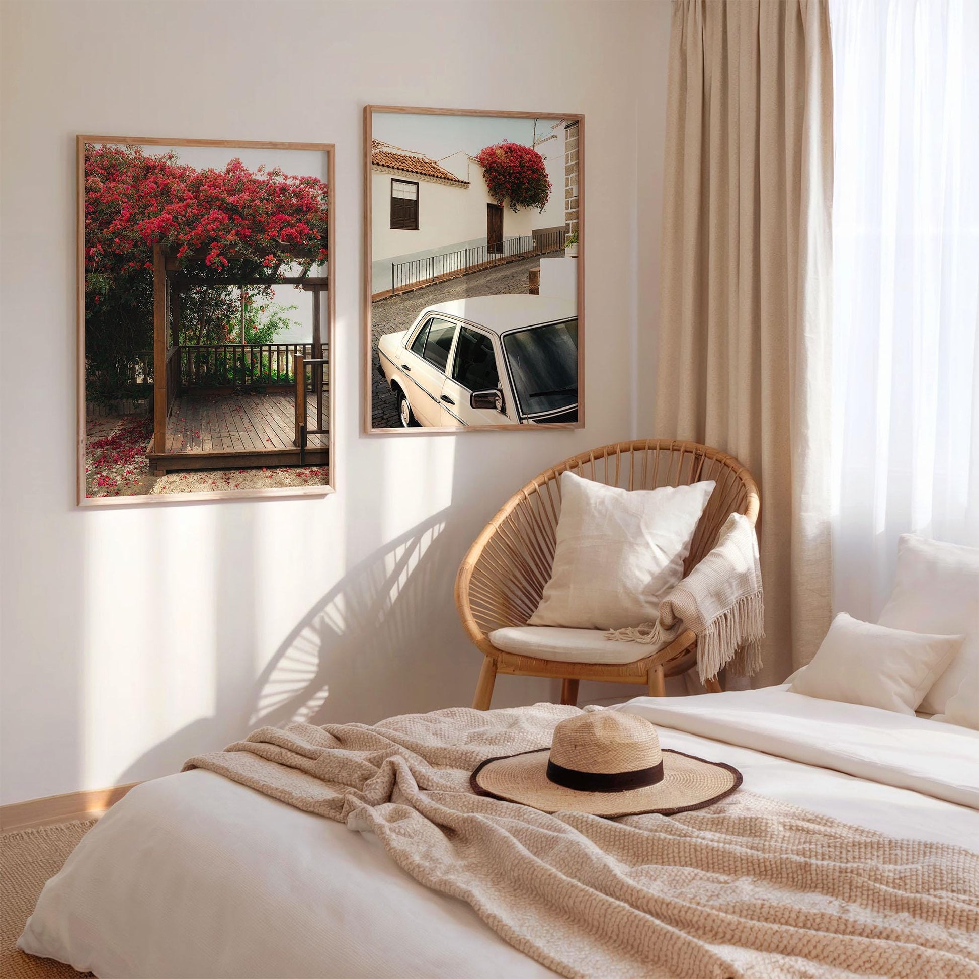 Cozy bedroom with neutral decor, rattan chair, hat on bed, and Classic Bougainvillea - Set of 2 wall art.