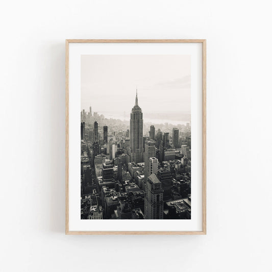 Empire State Building Black and White framed photo of a city skyline.