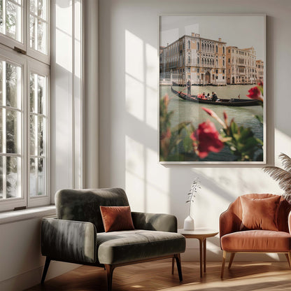 Sunlit modern living room with green and rust chairs, side table, and the Floral Passion framed photo on the wall.