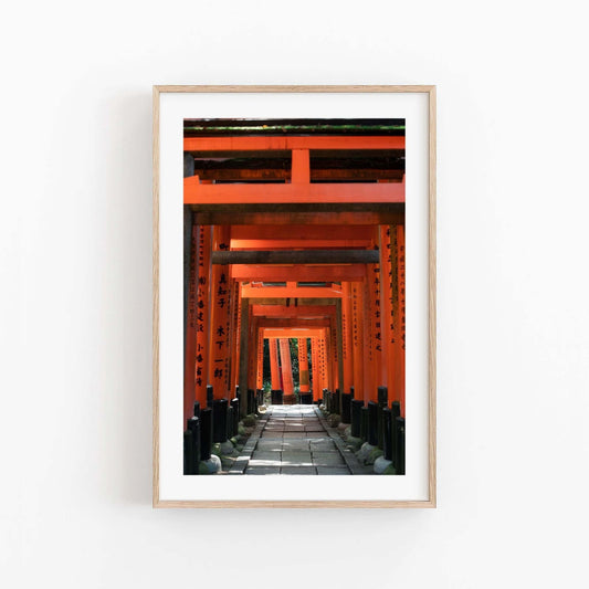 Displaying Fushimi Inari Taisha III on a white wall shows a pathway through red torii gates, creating a tunneling effect.