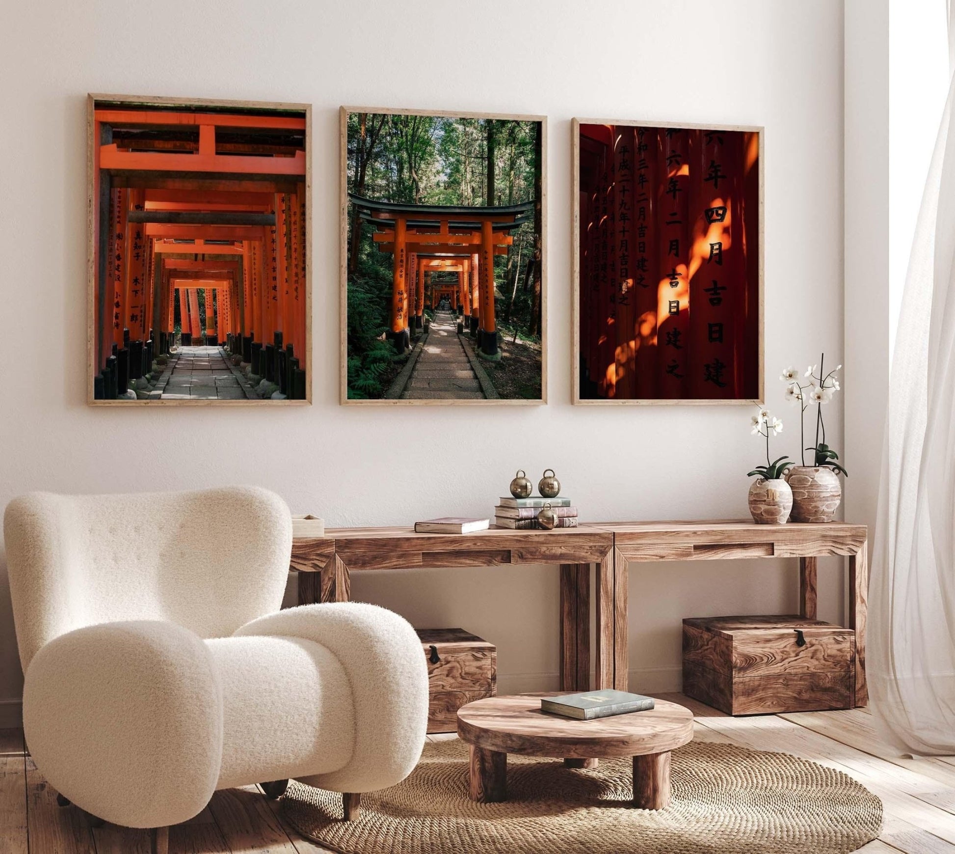 Stylish features a beige chair, wooden furniture, and three framed photography prints from the Fushimi Inari Taisha Set of 3, adorning the wall with images of Japanese red torii gates.