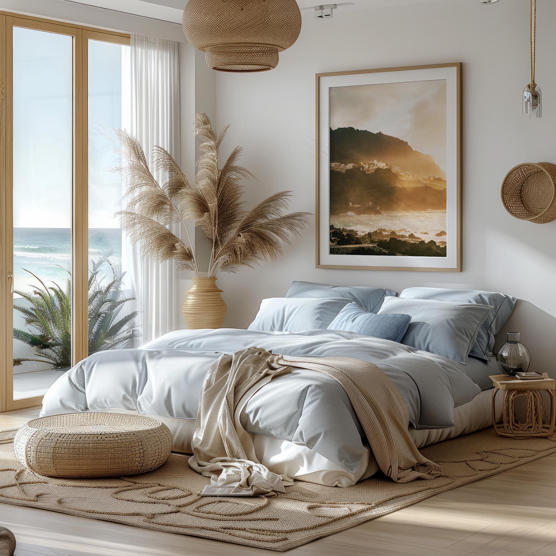 Cozy bedroom with ocean view, soft bedding, pampas grass, and Golden Garachico coastal decor in natural tones.