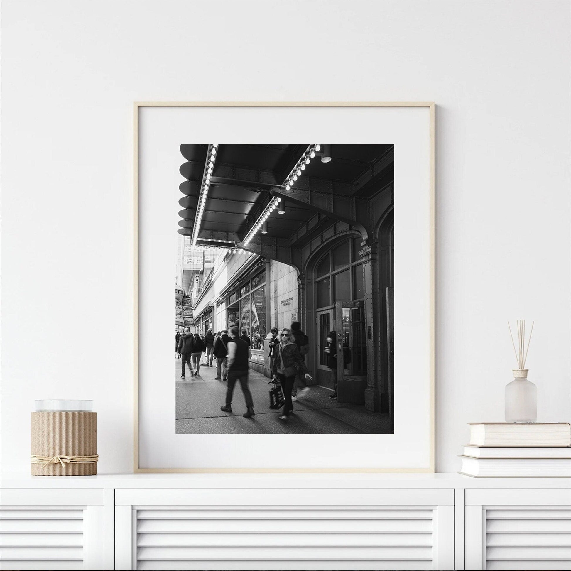 The Grand Central Rhythm Black and White photo is displayed on a white shelf.