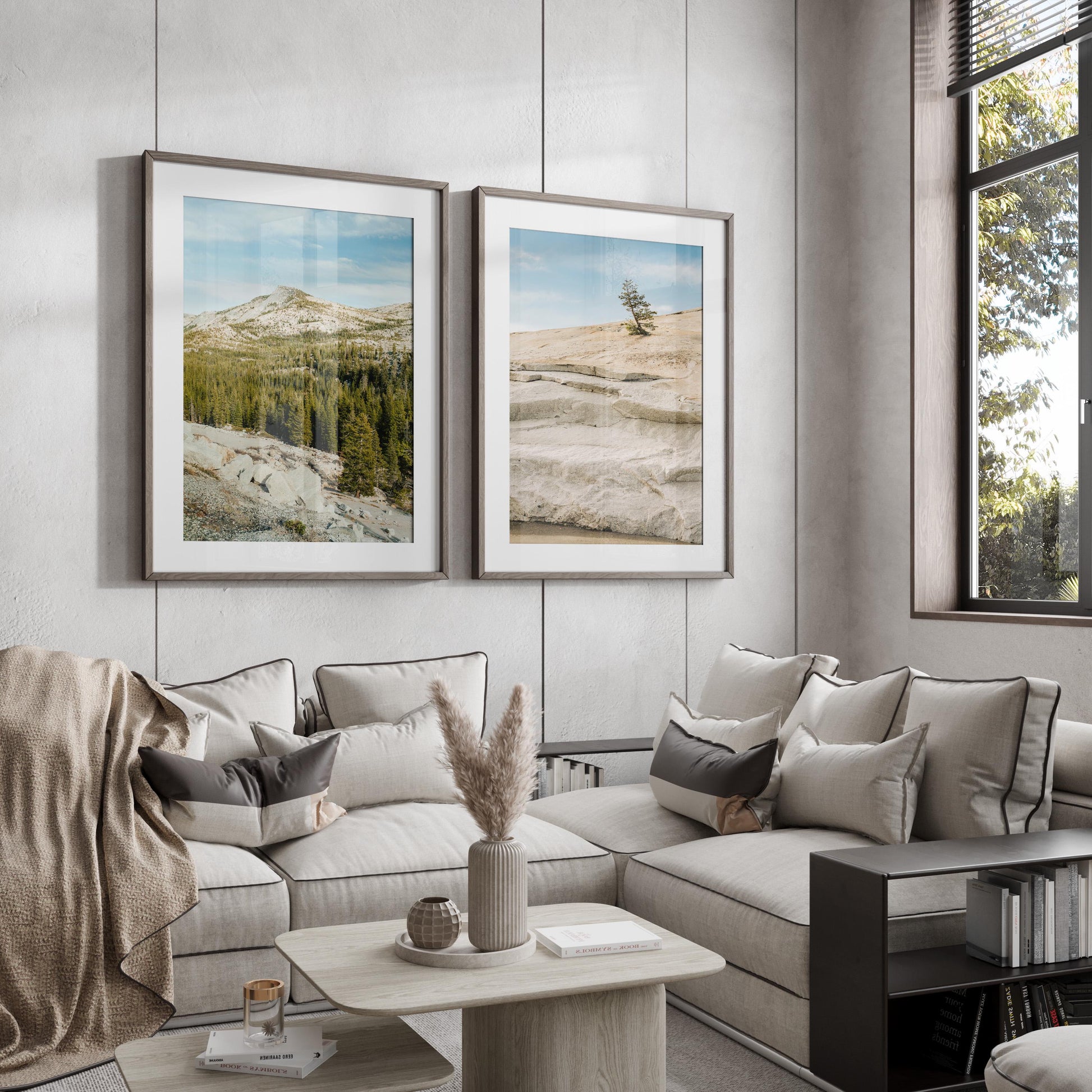 Modern living room with a comfy sectional, "Sierra Stillness - Set of 2" landscapes, and big windows for natural light.