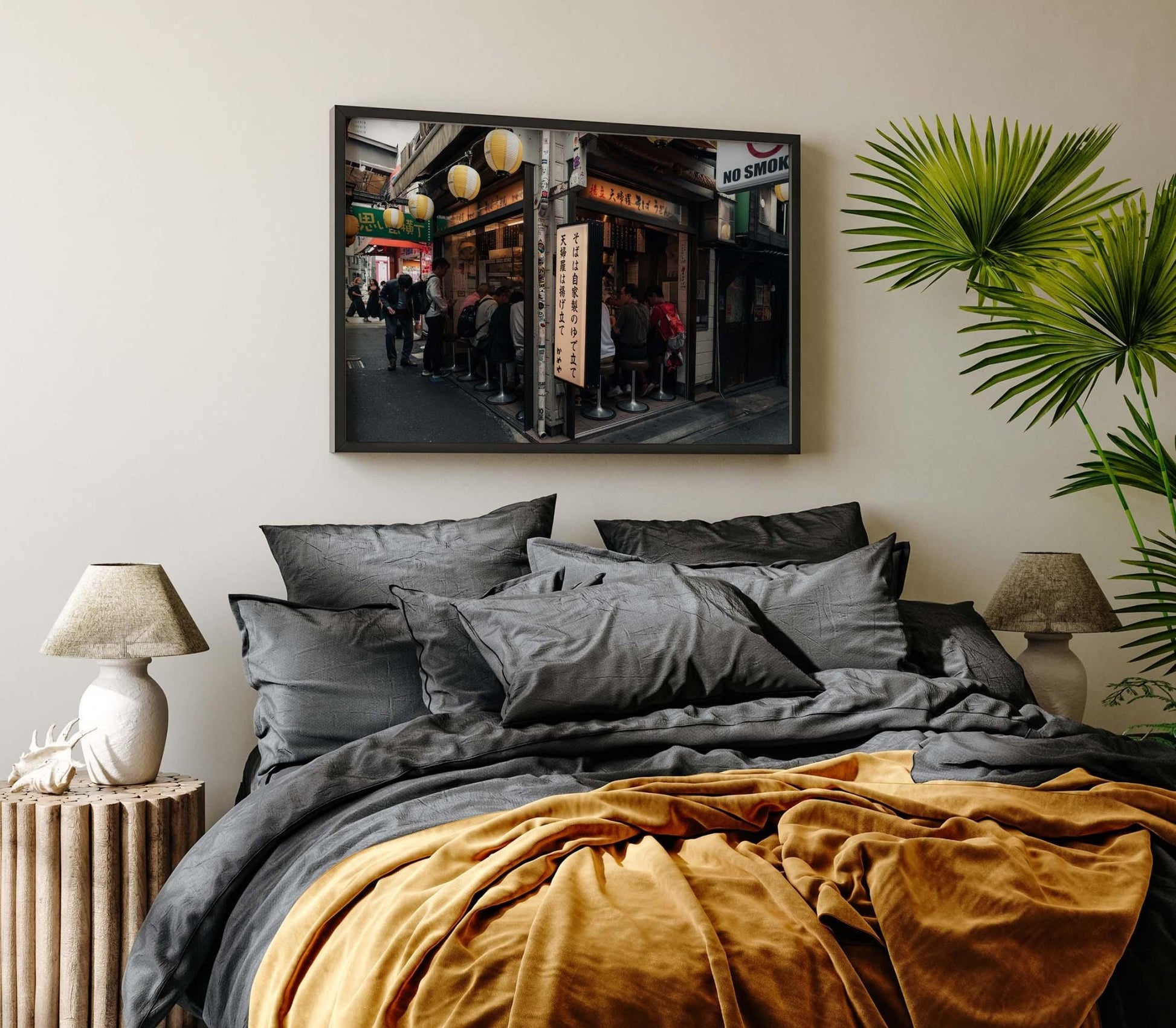 Cozy bedroom featuring the Kameya Soba photography print above the bed.