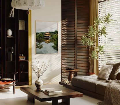 Modern living room featuring a cozy sofa, wooden coffee table, plants, and art inspired by the Kinkaku-ji Temple on the wall.