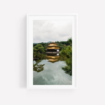 Kinkaku-ji Temple framed photo features a traditional Japanese structure reflecting on a serene pond amidst lush greenery.