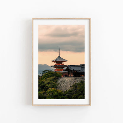 Framed photo titled "Kiyomizu-dera Sunset I" shows a Japanese pagoda among trees at sunset with a cloudy sky.