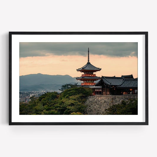 Framed photo, "Kiyomizu-dera Sunset II": traditional Japanese temple on a hill at sunset with mountains behind.