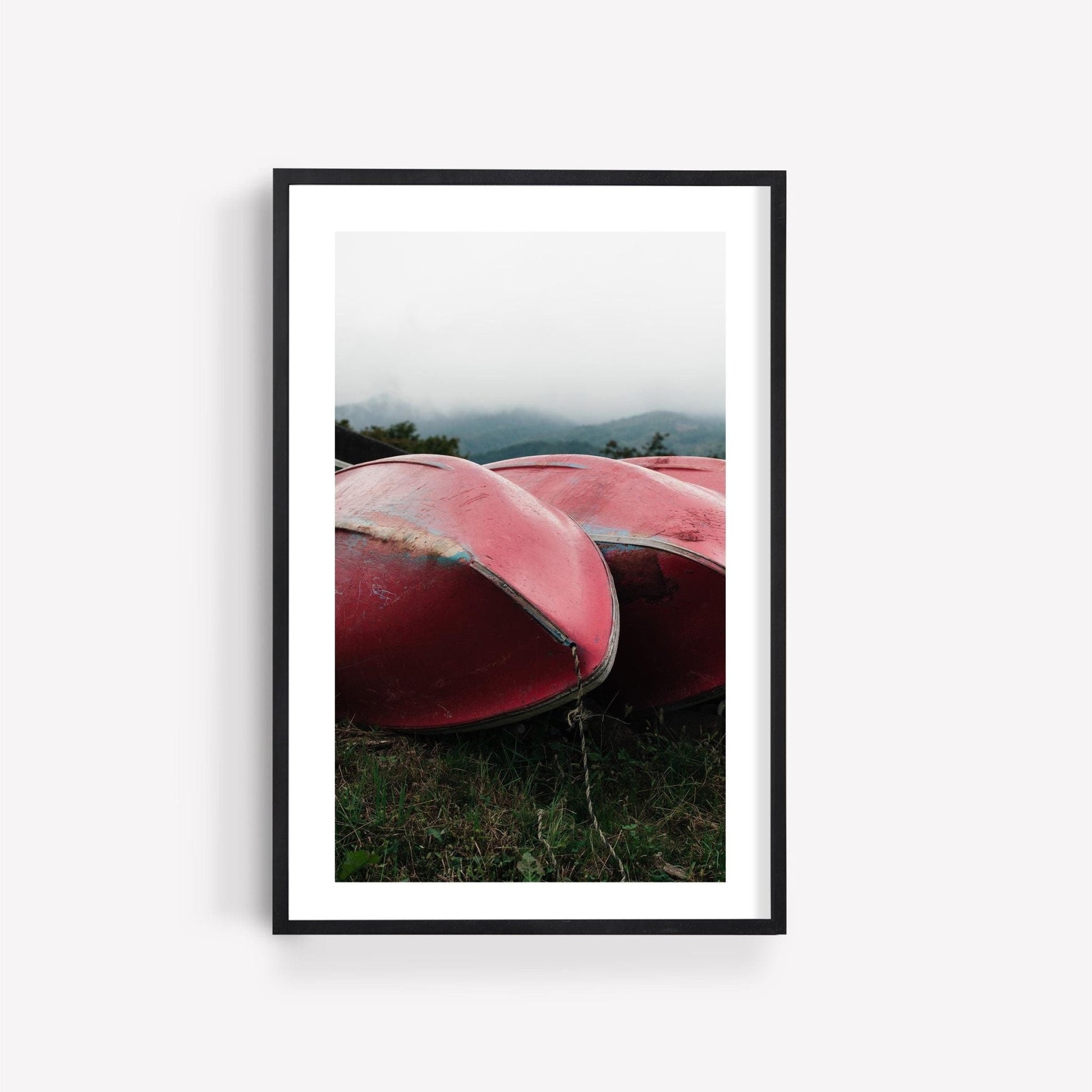 Framed photo titled Lake Kawaguchi Boats featuring red canoes on grass with misty mountains.