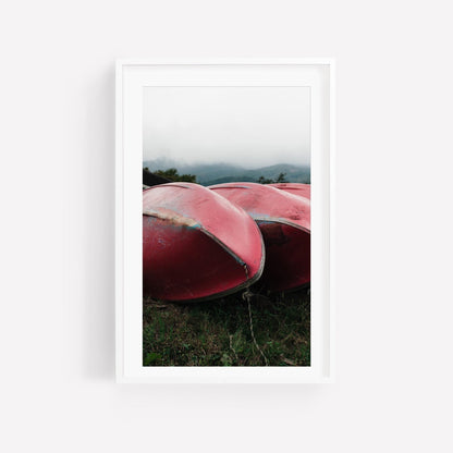 The Lake Kawaguchi Boats artwork features two red canoes on grass with misty mountains in the background, all elegantly framed in a white picture frame.