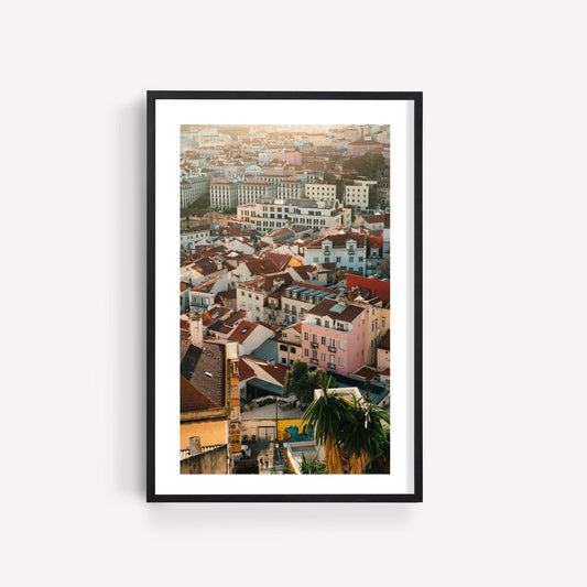 Lisbon Layers framed photo featuring vibrant city rooftops and buildings, displayed on a plain white wall.