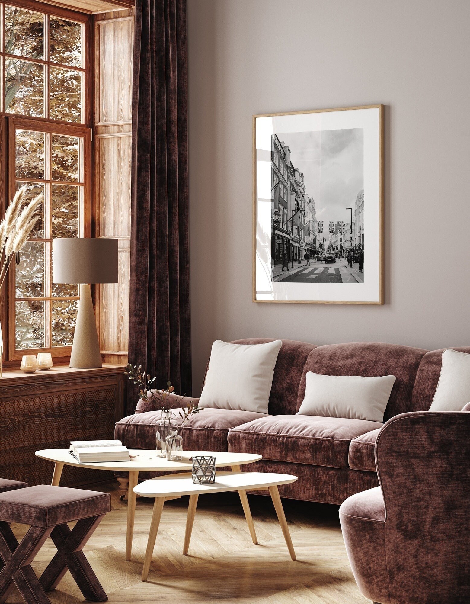 Stylish living room with brown velvet furniture, large window, and framed Mayfair Black and White cityscape art.