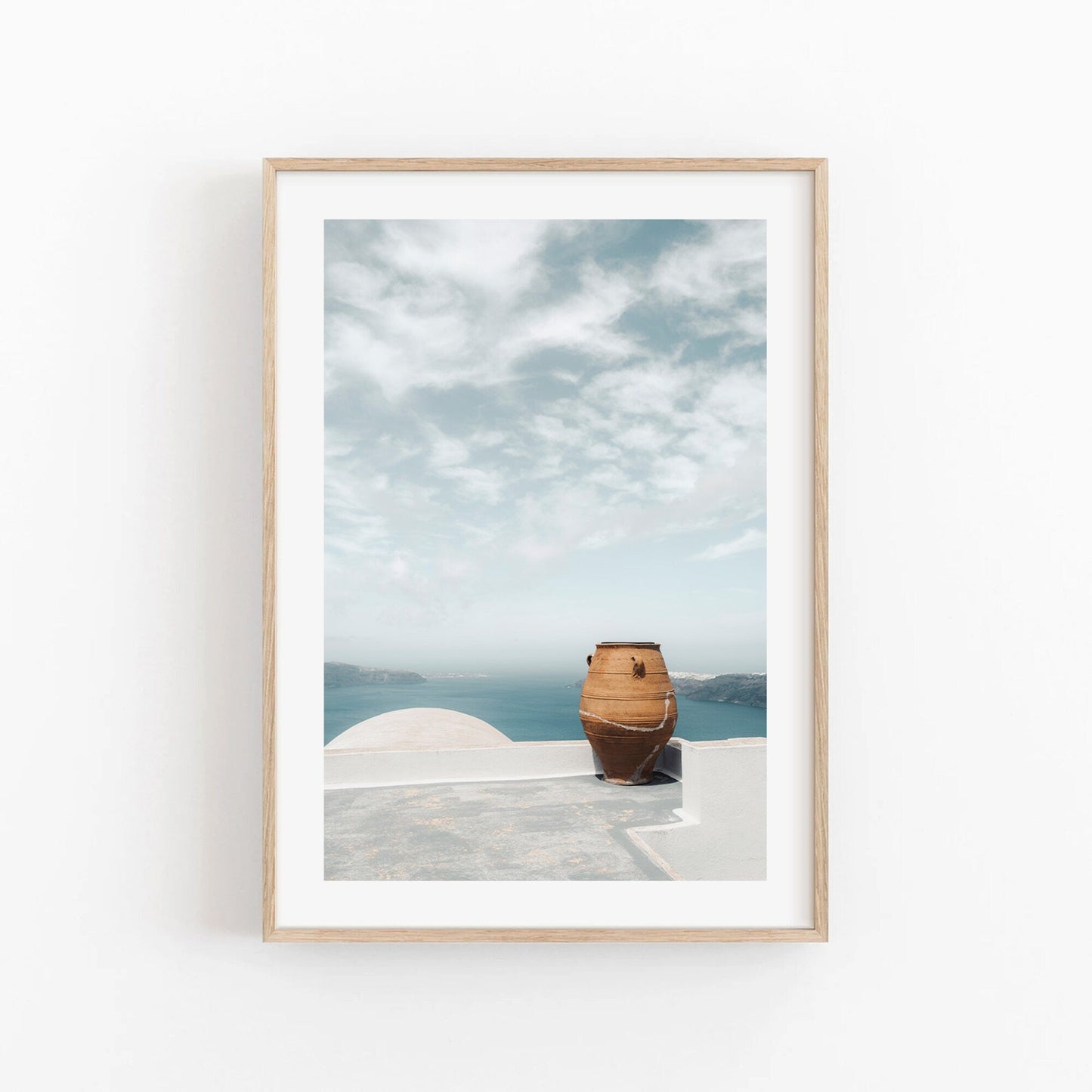 Framed photo of Mediterranean Planter on a rooftop overlooking the sea and sky.