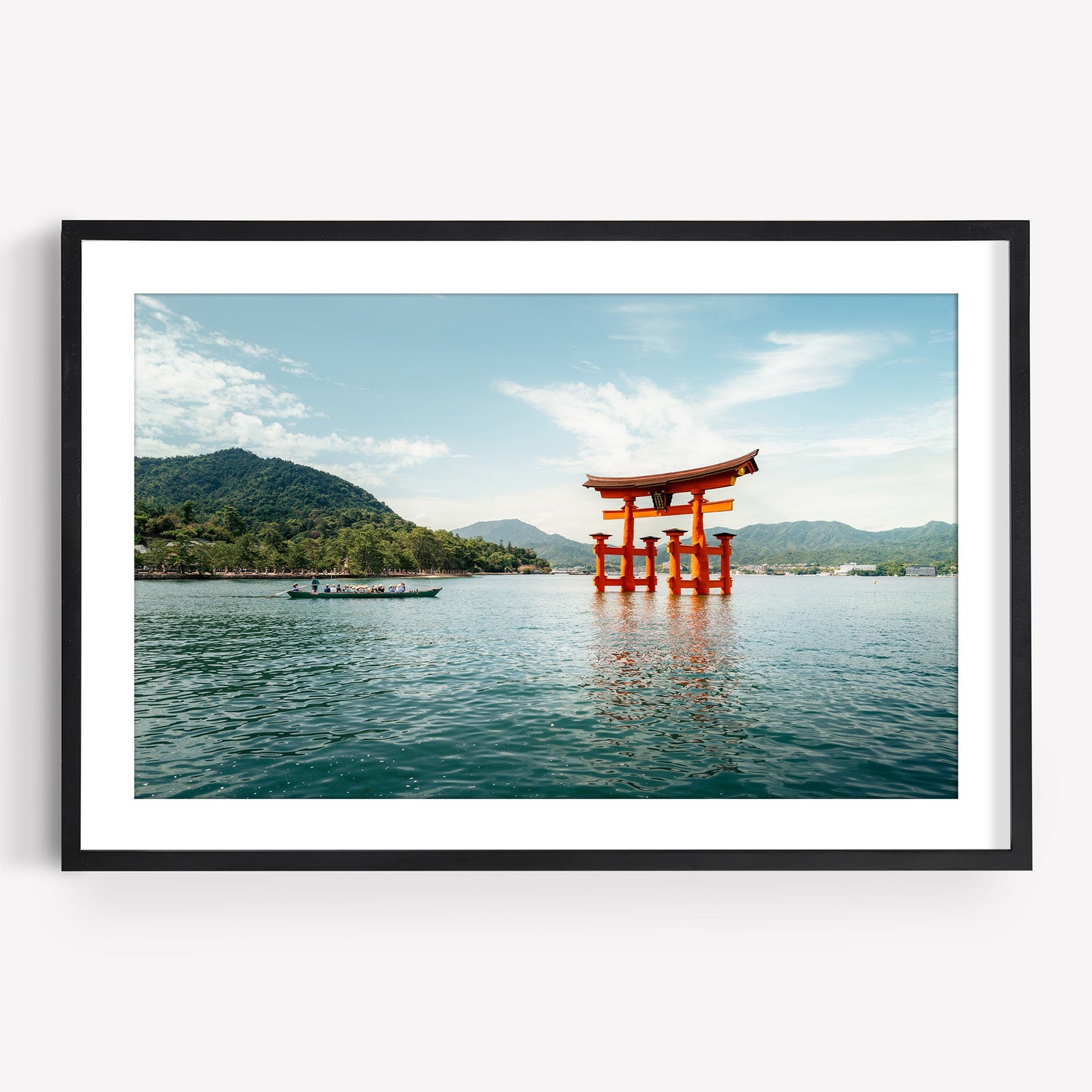 Miyajima Passage I: A framed photo of a red torii gate in water, with a boat and mountains under a blue sky.